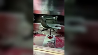 طلاء أجزاء ماكينة الخياطة بالرش